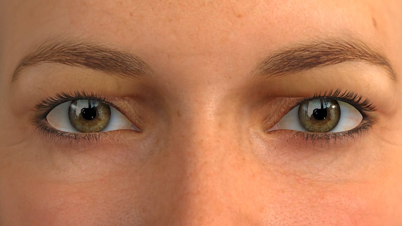 Close-up of realistic human eyes and eyebrows.